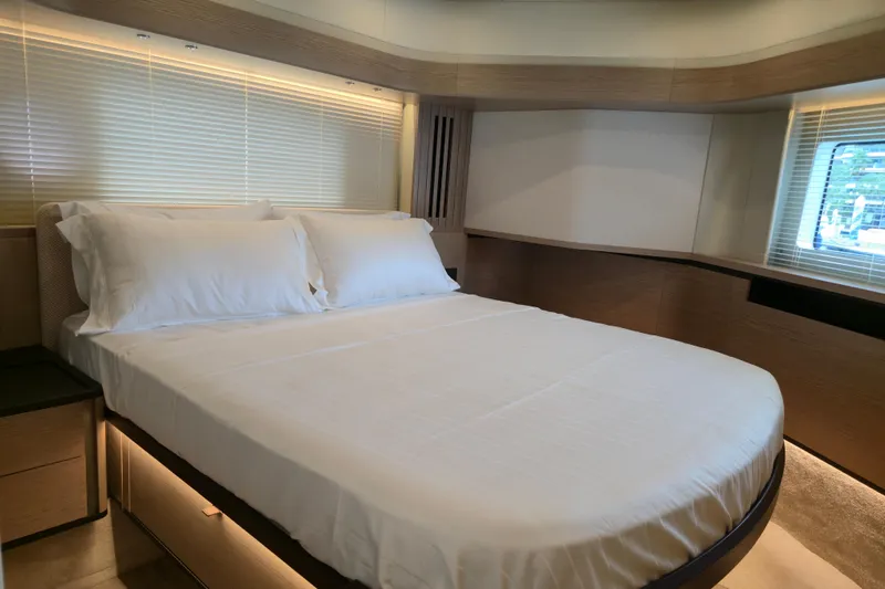  Yacht Photos Pics Luxurious bedroom interior of 2025 Absolute Navetta 53 yacht with modern design.