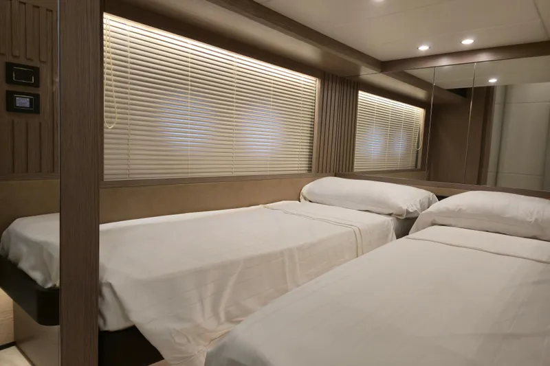  Yacht Photos Pics Luxurious twin cabin interior on 2025 Absolute Navetta 53 yacht.