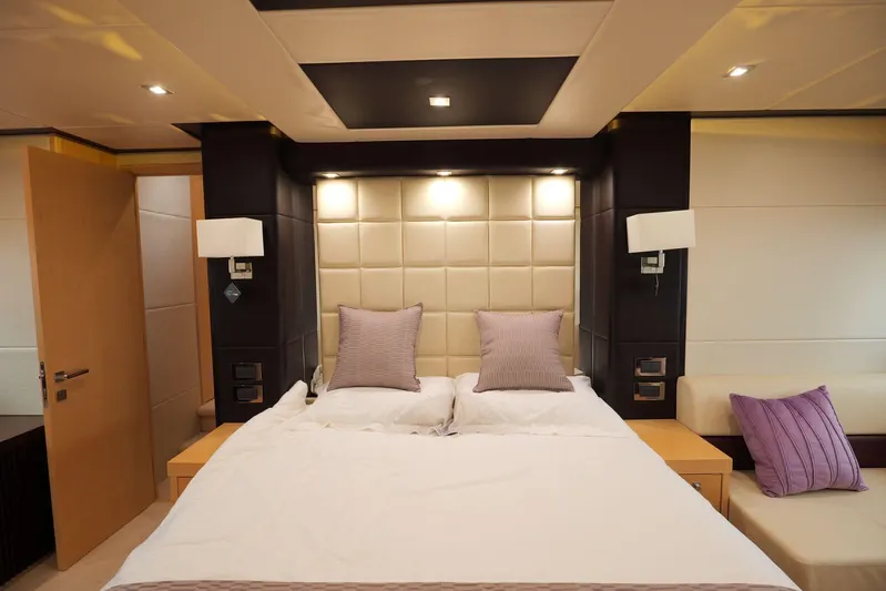  Yacht Photos Pics Luxurious bedroom interior of 2013 Sunseeker Manhattan 73 yacht with elegant decor.