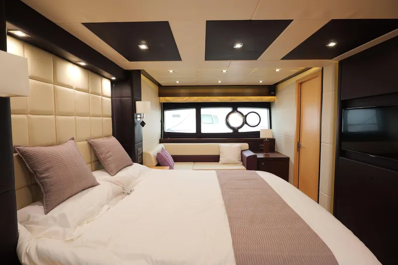  Yacht Photos Pics Luxurious bedroom interior of 2013 Sunseeker Manhattan 73 yacht with modern design elements.