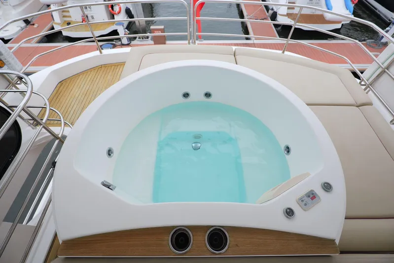  Yacht Photos Pics Luxurious jacuzzi on 2013 Sunseeker Manhattan 73 yacht, docked at marina.