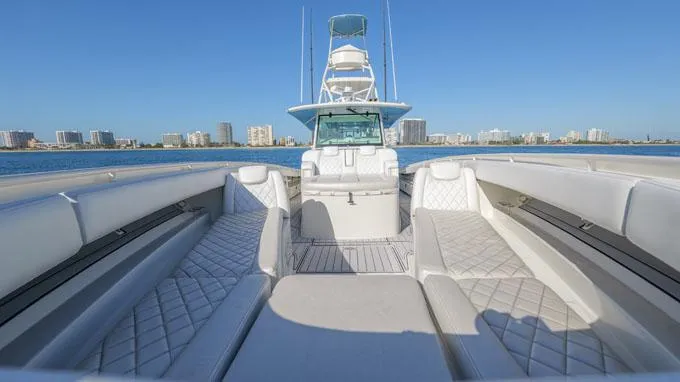 Reel Addiction Yacht Photos Pics Luxury HCB Suenos 53 yacht interior with city skyline in background, 2016 model.