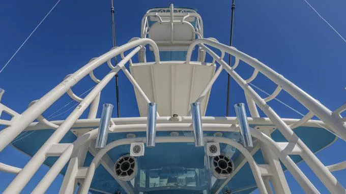 Reel Addiction Yacht Photos Pics 2016 HCB Suenos 53 boat tower with blue sky background.