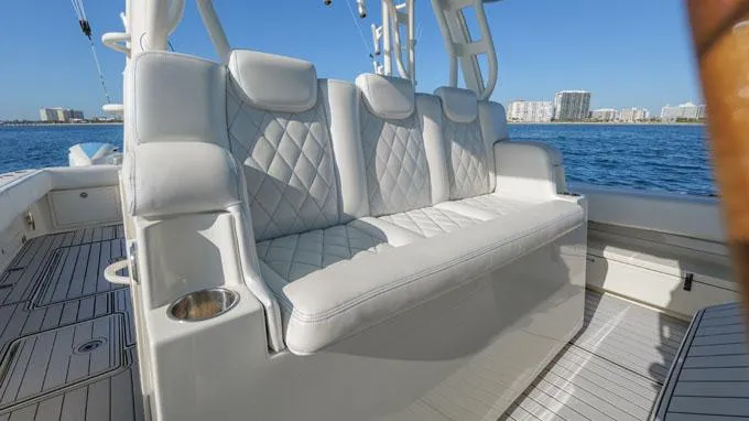 Reel Addiction Yacht Photos Pics Luxurious seating on 2016 HCB Suenos 53 boat with ocean view.