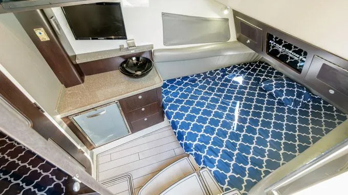 Reel Addiction Yacht Photos Pics Luxurious interior of 2016 HCB Suenos 53 yacht with modern amenities and stylish decor.