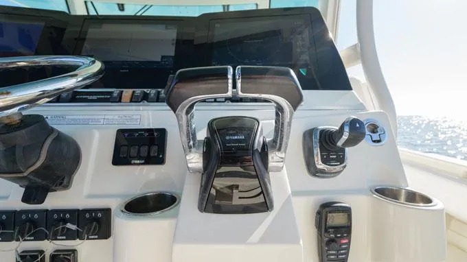 Reel Addiction Yacht Photos Pics Control panel of a 2016 HCB Suenos 53 boat, featuring modern navigation equipment.