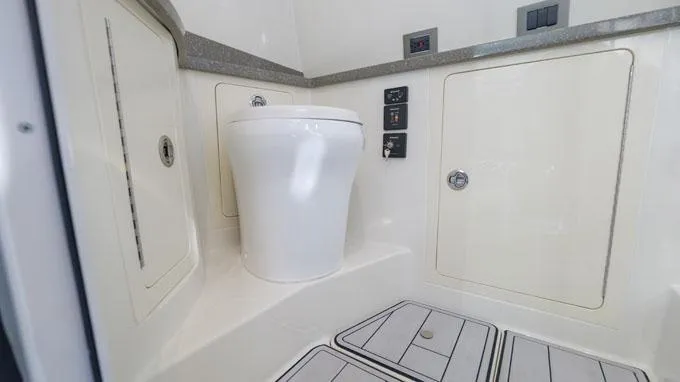 Reel Addiction Yacht Photos Pics Luxury bathroom on 2016 HCB Suenos 53 yacht, featuring modern fixtures and sleek design.