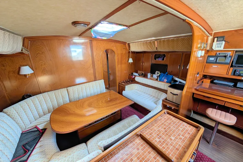 Iteration Yacht Photos Pics Luxurious interior of 1994 Amel 53 Super Maramu yacht with elegant wood finish.