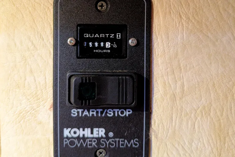 Iteration Yacht Photos Pics Kohler power system panel with hour meter on Amel 53 Super Maramu, 1994 model.