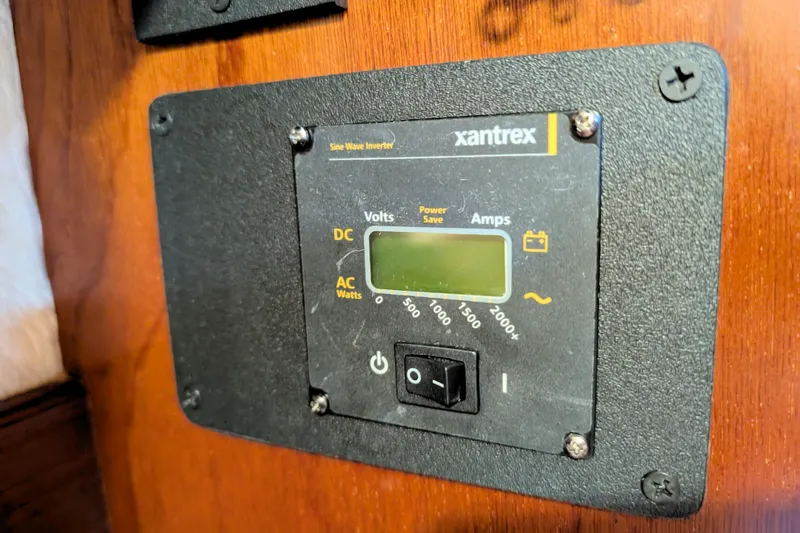 Iteration Yacht Photos Pics Xantrex sine wave inverter on 1994 Amel 53 Super Maramu yacht, mounted on wooden panel.