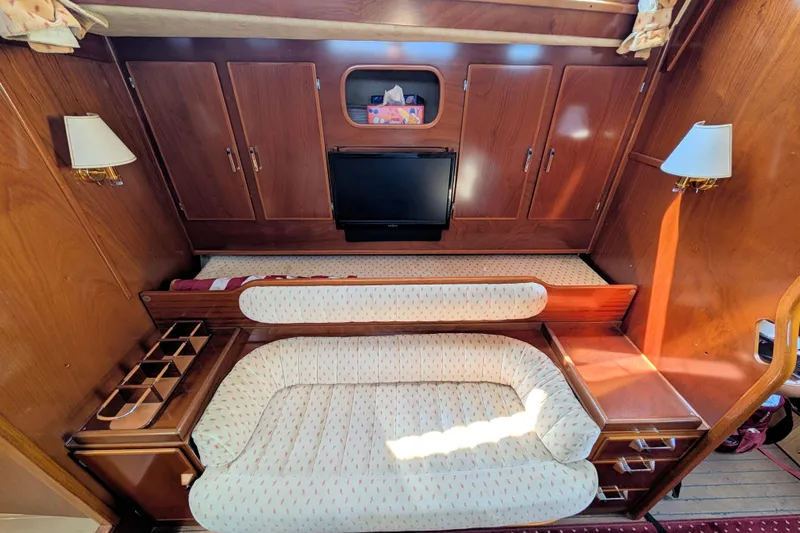 Iteration Yacht Photos Pics Luxurious interior of 1994 Amel 53 Super Maramu yacht with elegant wood finish.