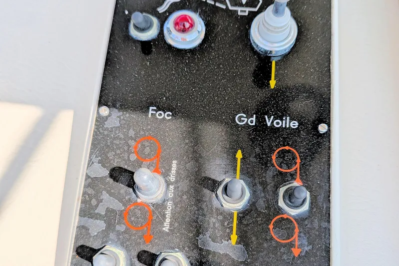 Iteration Yacht Photos Pics Control panel of a 1994 Amel 53 Super Maramu sailboat with labeled switches.