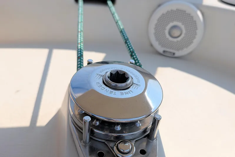 Iteration Yacht Photos Pics Winch on 1994 Amel 53 Super Maramu sailboat deck with speaker in background.