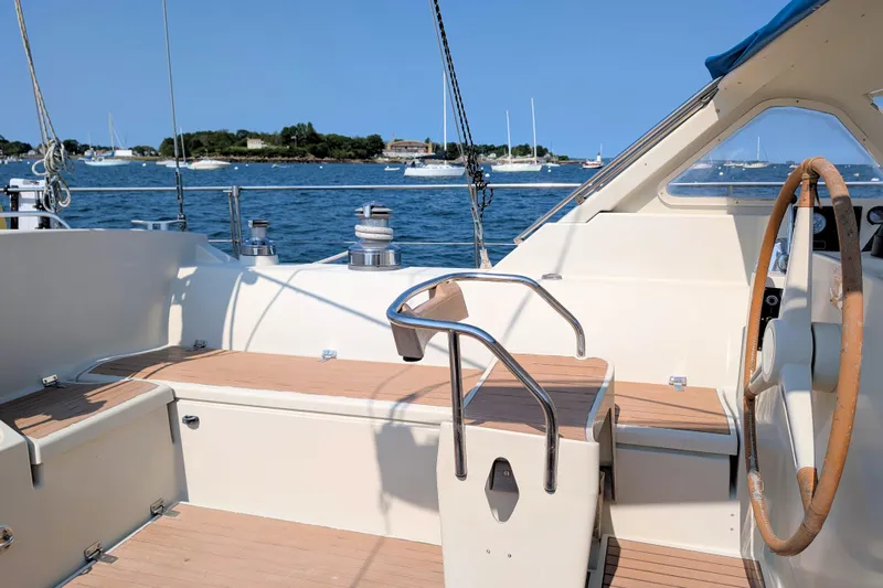 Iteration Yacht Photos Pics Cockpit of 1994 Amel 53 Super Maramu sailboat with scenic ocean view.