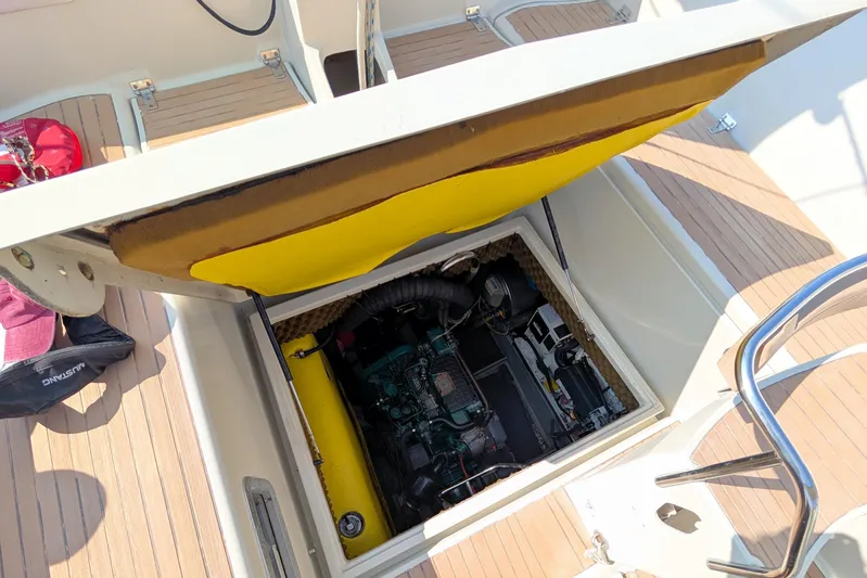 Iteration Yacht Photos Pics Engine compartment of 1994 Amel 53 Super Maramu sailboat, open hatch view.