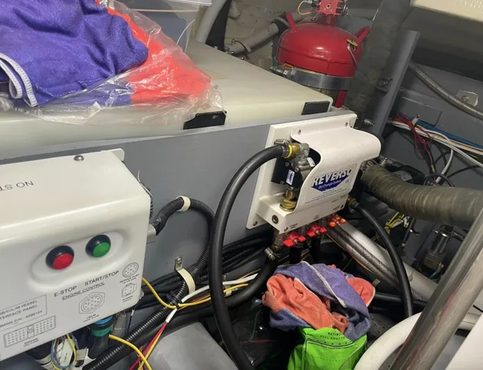  Yacht Photos Pics Engine room of a 2016 Carver C43 Coupe with mechanical components and wiring.