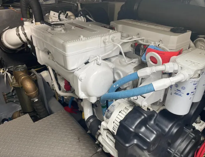  Yacht Photos Pics Engine compartment of a 2016 Carver C43 Coupe, showcasing detailed mechanical components.