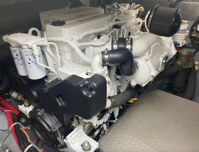  Yacht Photos Pics Engine of a 2016 Carver C43 Coupe, showcasing intricate mechanical components and filters.