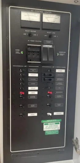  Yacht Photos Pics Electrical control panel with switches and meters in a Carver C43 Coupe, 2016 model.