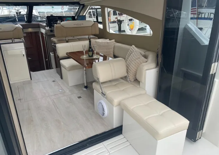  Yacht Photos Pics Luxurious interior of a 2016 Carver C43 Coupe yacht with plush seating and elegant decor.