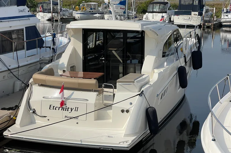  Yacht Photos Pics Luxury yacht "Eternity II" docked at marina, featuring sleek design and elegant amenities.