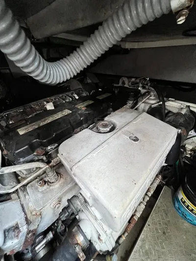 El Andariego Yacht Photos Pics Engine compartment of a 2008 Sunseeker Portofino 47 yacht, showcasing mechanical components.