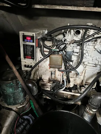 El Andariego Yacht Photos Pics Engine compartment of a 2008 Sunseeker Portofino 47 yacht, showing mechanical components and wiring.