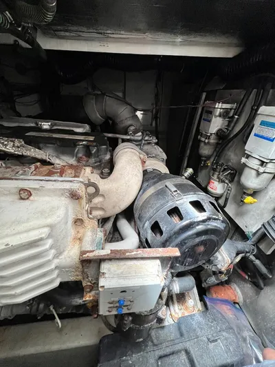 El Andariego Yacht Photos Pics Engine compartment of a 2008 Sunseeker Portofino 47 yacht, showcasing mechanical components.