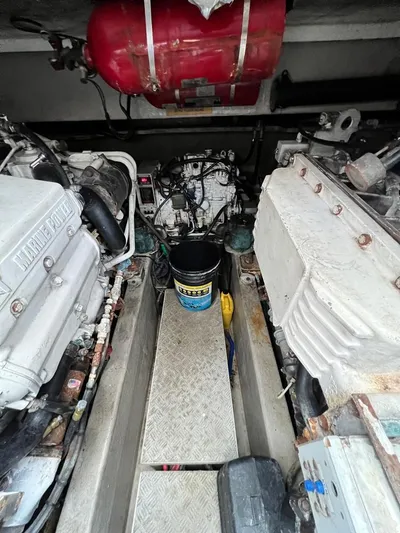 El Andariego Yacht Photos Pics Engine room of a 2008 Sunseeker Portofino 47 yacht, featuring mechanical components.