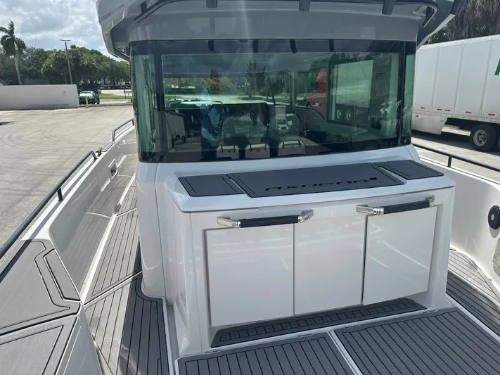  Yacht Photos Pics 2020 Axopar 37 XC CROSS CABIN boat with sleek design and spacious deck.