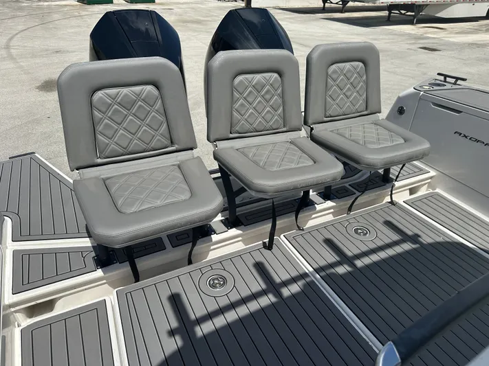  Yacht Photos Pics Three gray cushioned seats on 2020 Axopar 37 XC CROSS CABIN boat deck.