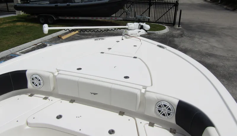  Yacht Photos Pics 2021 Tidewater 2700 Carolina Bay boat deck with speakers and storage compartments.