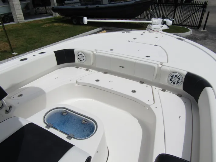  Yacht Photos Pics 2021 Tidewater 2700 Carolina Bay boat interior with seating and storage compartments.
