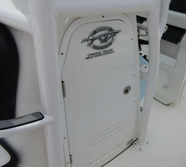  Yacht Photos Pics 2021 Tidewater 2700 Carolina Bay console door, deluxe head door console.