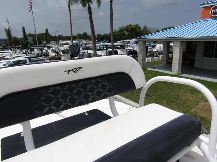  Yacht Photos Pics 2021 Tidewater 2700 Carolina Bay boat seat with marina background.