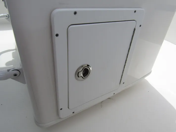 Yacht Photos Pics 2021 Tidewater 2700 Carolina Bay storage compartment with secure latch.