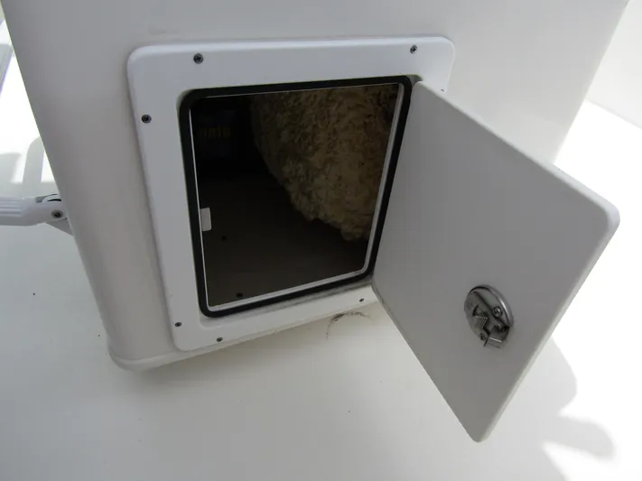  Yacht Photos Pics Open storage compartment on 2021 Tidewater 2700 Carolina Bay boat.
