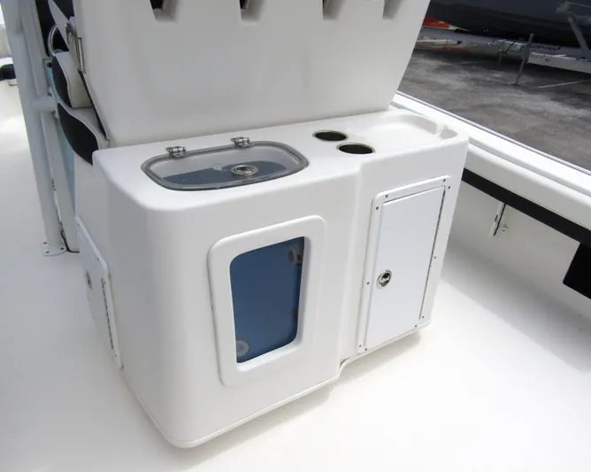  Yacht Photos Pics 2021 Tidewater 2700 Carolina Bay boat console with storage and cup holders.