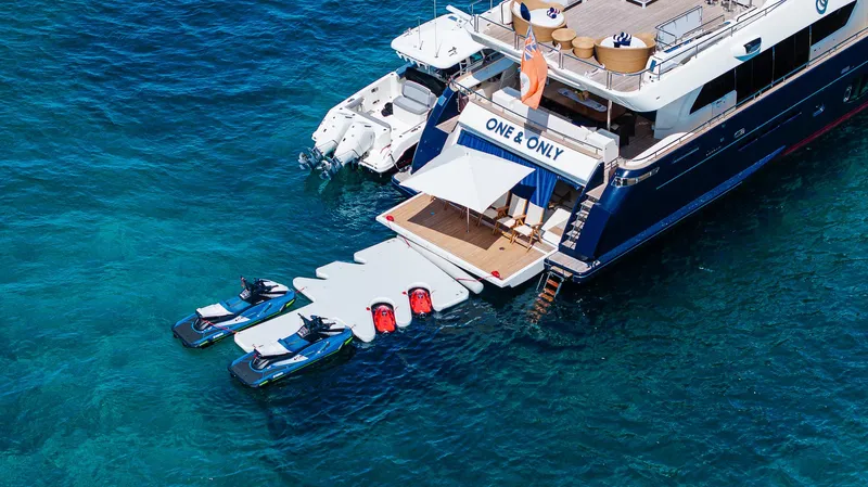 One And Only Yacht Photos Pics Luxury yacht "One & Only" with jet skis on turquoise water, Custom Line 100, 2012 model.