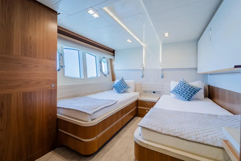 One And Only Yacht Photos Pics Luxurious twin cabin interior on a 2012 Custom Line 100 yacht, featuring modern design and comfort.