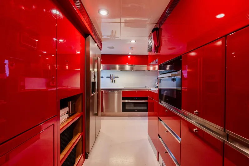One And Only Yacht Photos Pics Luxurious red kitchen interior in a 2012 Custom Line 100 yacht.