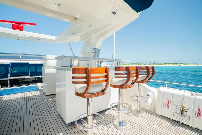 One And Only Yacht Photos Pics Luxury yacht deck with bar stools, ocean view, Custom Line 100, 2012 model.