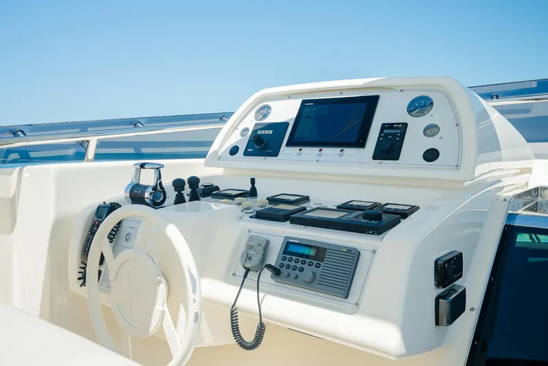 One And Only Yacht Photos Pics Control panel of a 2012 Custom Line 100 yacht with navigation instruments.