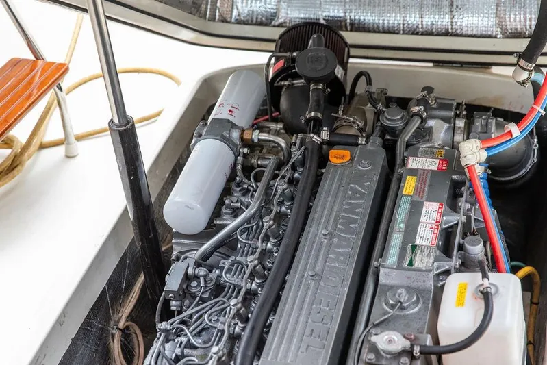 Chaser Yacht Photos Pics Engine compartment of a 2004 Hinckley Picnic Boat EP, featuring a Yanmar diesel engine.