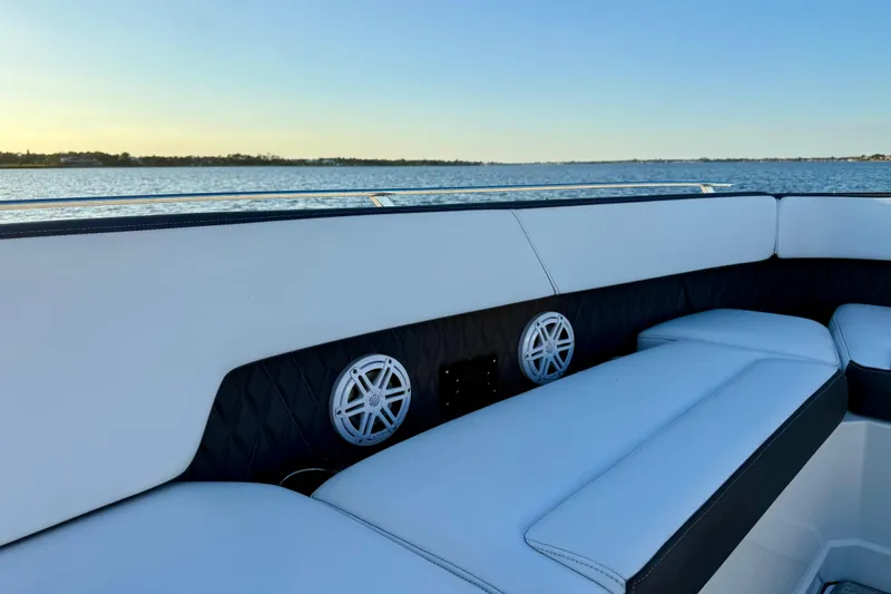  Yacht Photos Pics Luxurious seating on 2022 Monterey 385SS Super Sport boat with scenic water view.