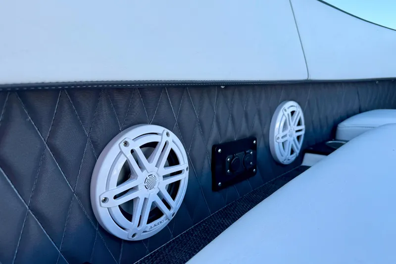  Yacht Photos Pics 2022 Monterey 385SS Super Sport boat interior with speakers and quilted upholstery.