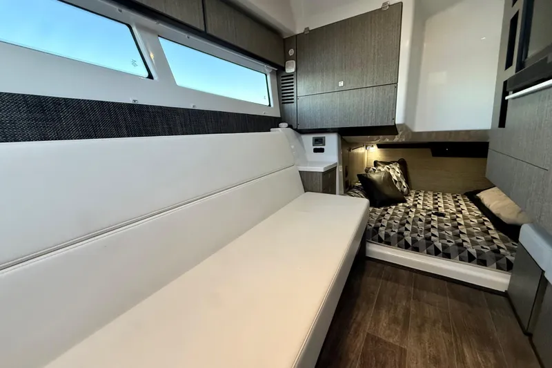  Yacht Photos Pics Interior of 2022 Monterey 385SS Super Sport boat with modern seating and bedding.