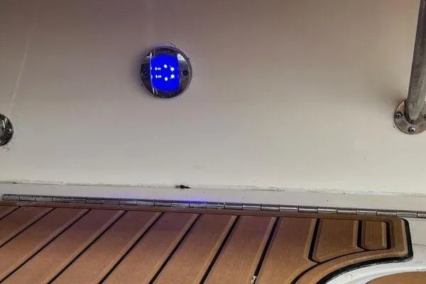  Yacht Photos Pics 2003 Sea Ray 410 Sundancer interior with wooden flooring and blue LED light.