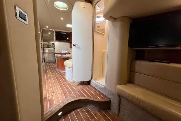  Yacht Photos Pics Interior of 2003 Sea Ray 410 Sundancer yacht with wood flooring and modern amenities.
