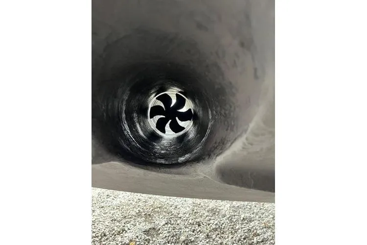  Yacht Photos Pics Close-up of a 2003 Sea Ray 410 Sundancer's bow thruster propeller.